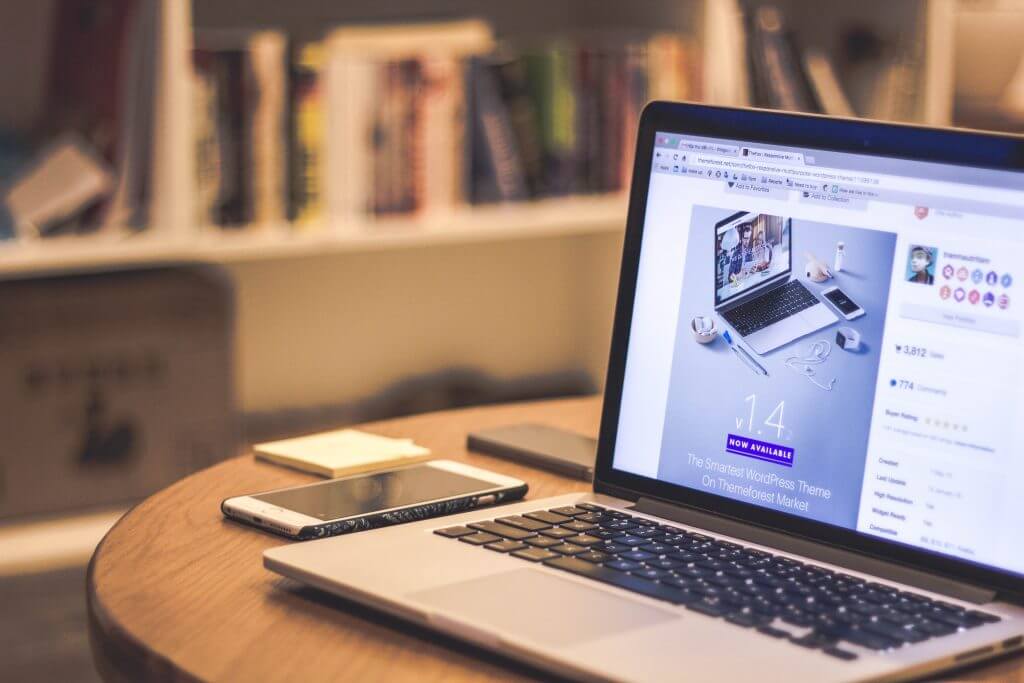 Image of a mobile phone and laptop.
